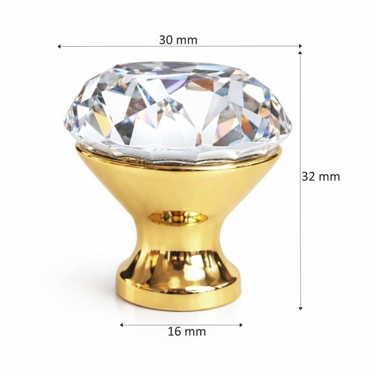 Buton de mobilă cu cristal și bază aurie, fotografiat pe fundal alb.